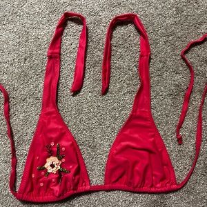 Hot pink fuchsia string bikini, with embroidery on one side. Fits like sm-med.